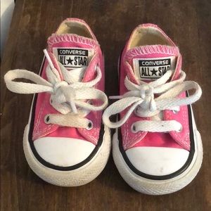 Pink and white converse sneakers